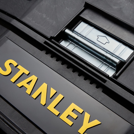Photo of STANLEY FATMAX black toolbox lid with yellow logo and visible metal hinge. SKU 020800R.
