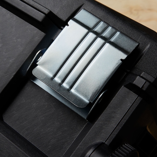 STANLEY 020800R latch detail on black toolbox, close-up photography showing metal clasp.