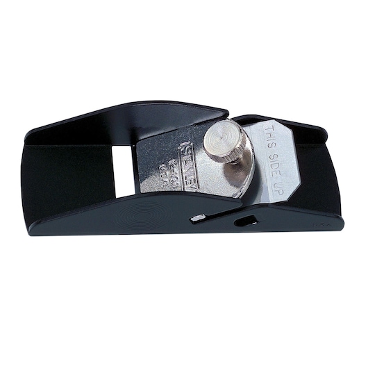 STANLEY 12-101 block plane, metal body, woodworking tool, top angle on white background.