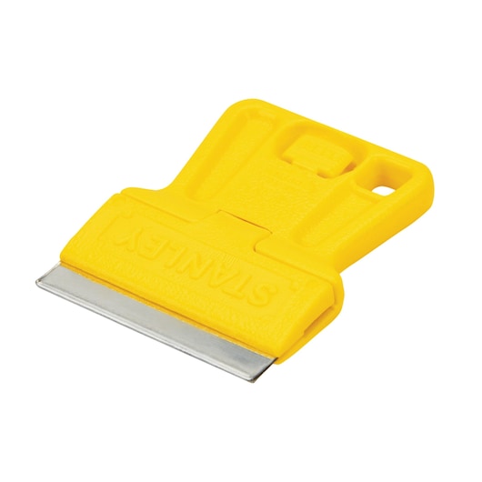 Stanley yellow plastic utility scraper with exposed metal blade, angled on white background