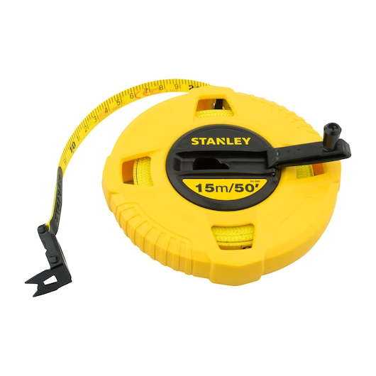 STANLEY 34-260 yellow open reel measuring tape, 15m/50ft, photography, top angle.