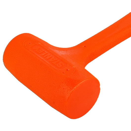 Photo of STANLEY 57-531 orange dead blow hammer on white background, showing textured head and handle.