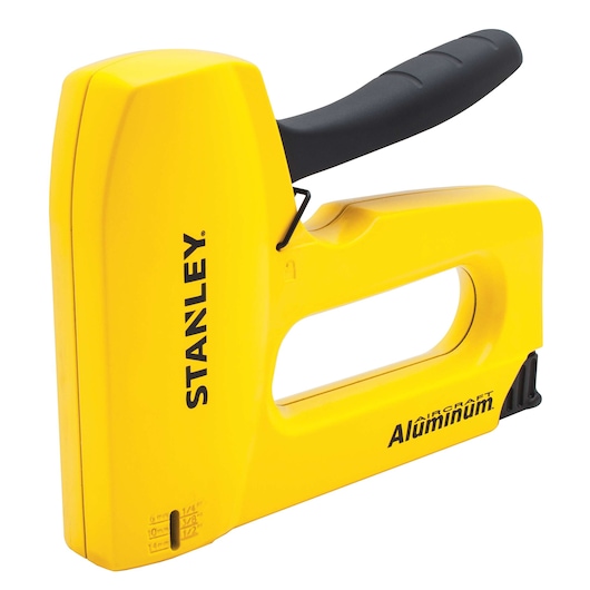 Stanley aluminum staple gun, yellow body with black handle, side angle on white background